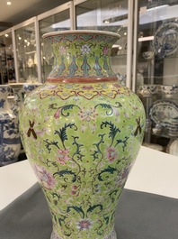 A Chinese famille rose lime-green-ground vase, Qianlong mark, 19/20th C.